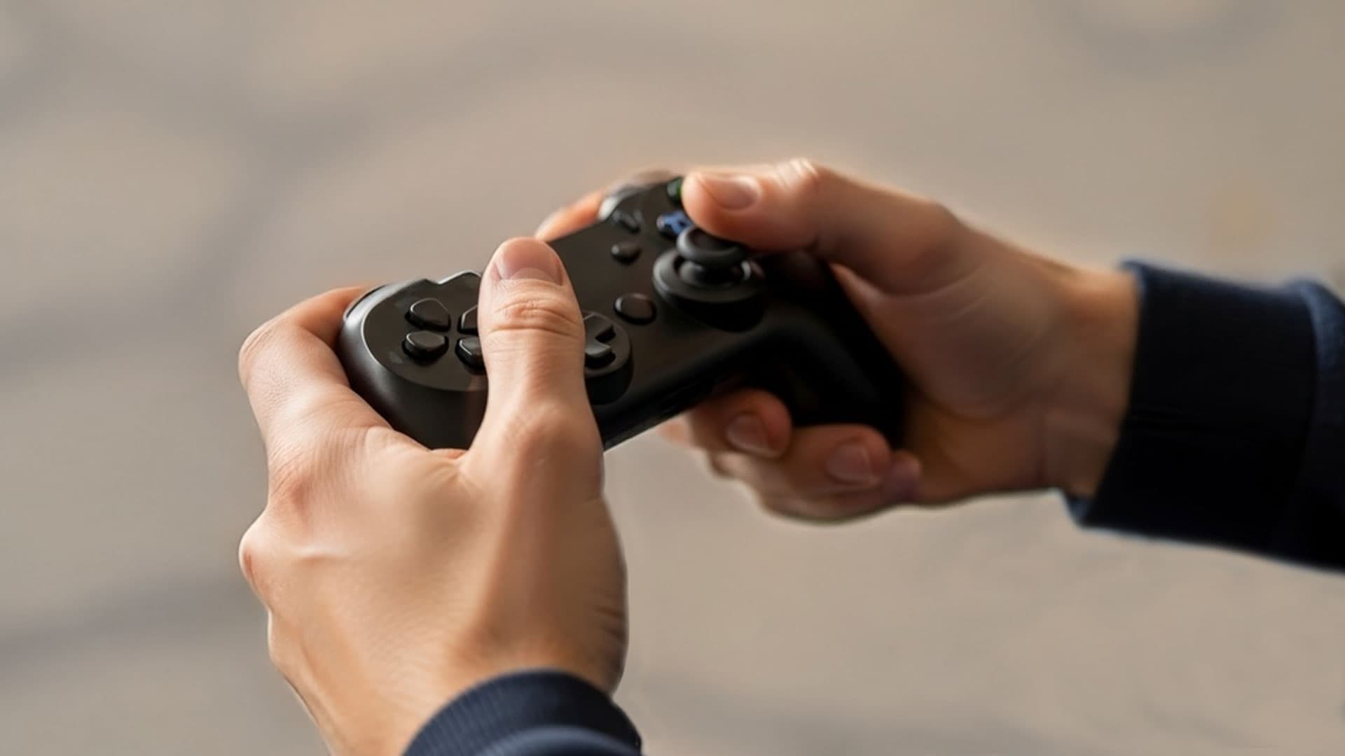 Hands holding the Xbox controller used for Drone Racer